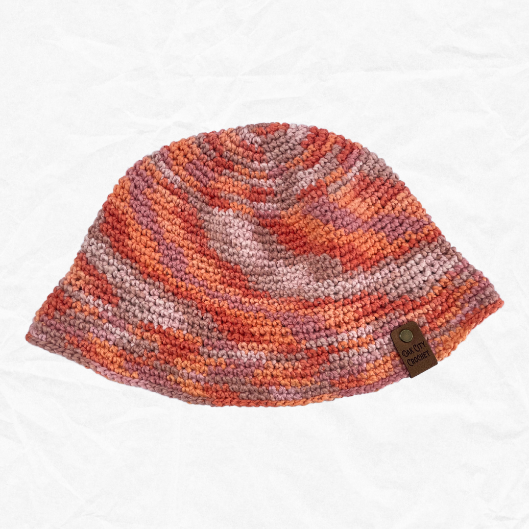 Shakedown Swirl Crochet Bucket Hat in Orange and Pink